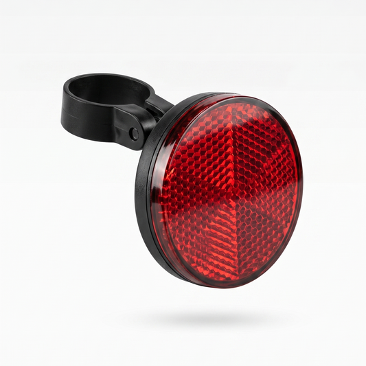 Tracedwn reflector with a concealed Apple Find My bike tracker inside