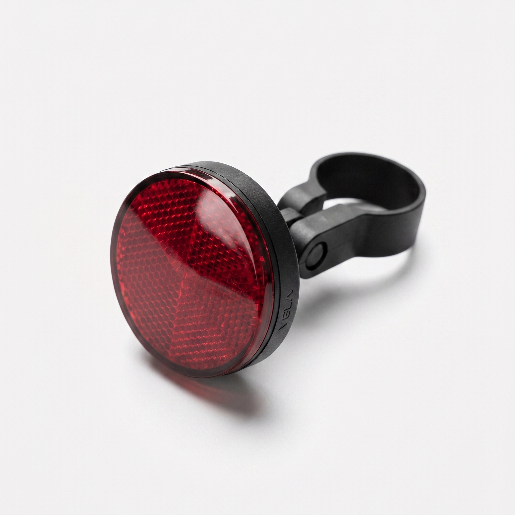 Close-up of the Tracedwn hidden bike GPS tracker reflector